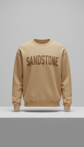 Sandstone bold typography sweatshirt, Single-product focus: hero garment displayed on matte plinth or hanger against...