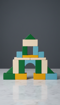 Building Block Set A, centered on a smooth surface with a Slate Gray background. The set is arranged neatly and...
