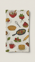 A Culinary Comfort tea towel with vibrant culinary-themed designs, shown in a straight-on front view against a soft...